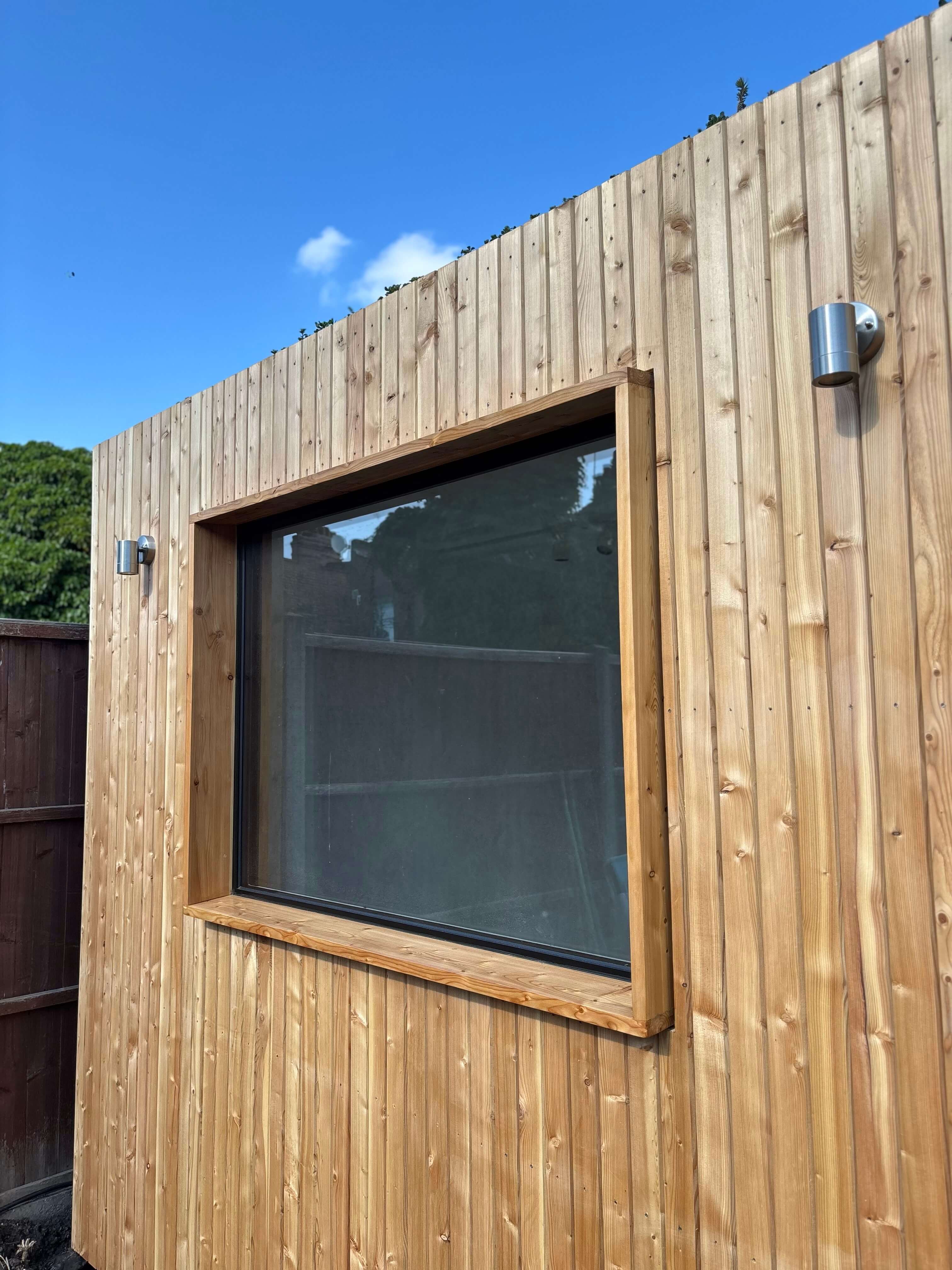 Large window and larch cladding