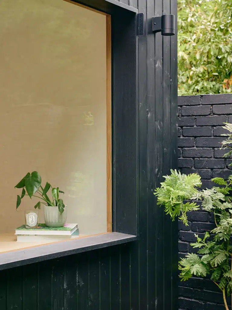 Garden home office with black cladding window detail