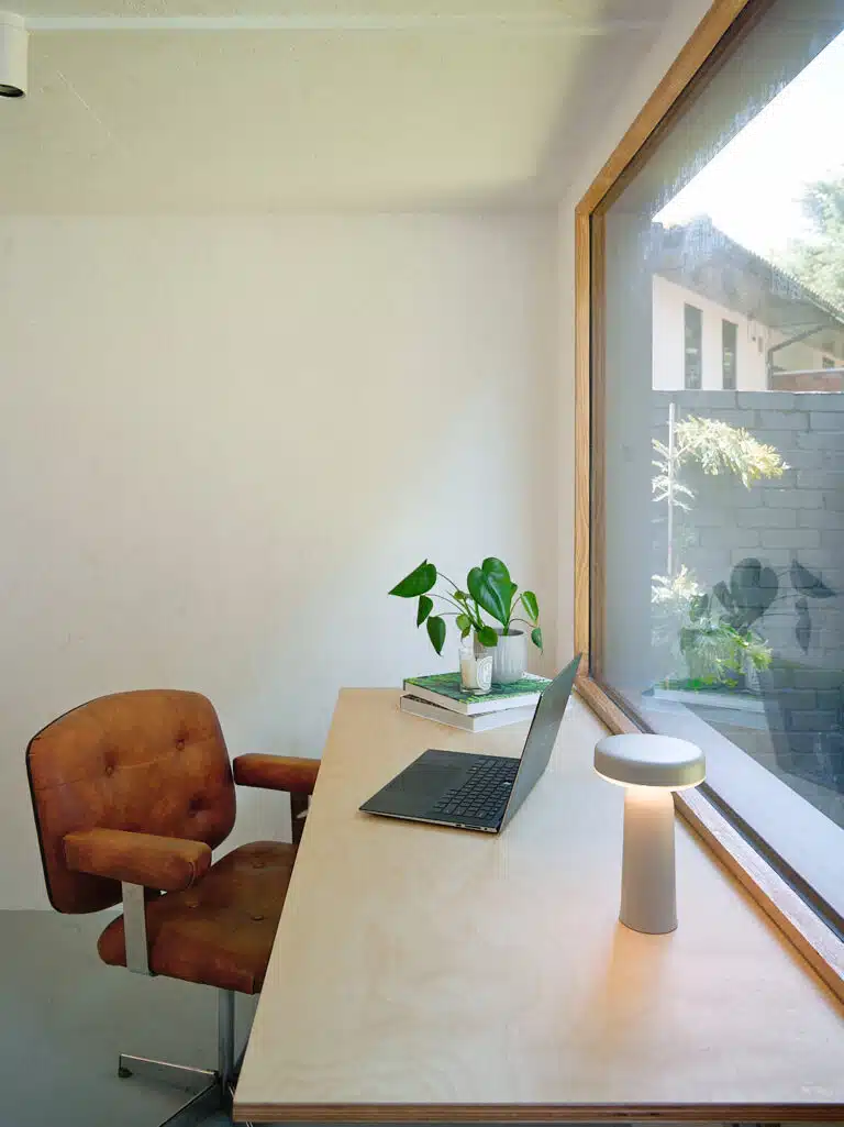 garden Studio interior view with birch plywood desk