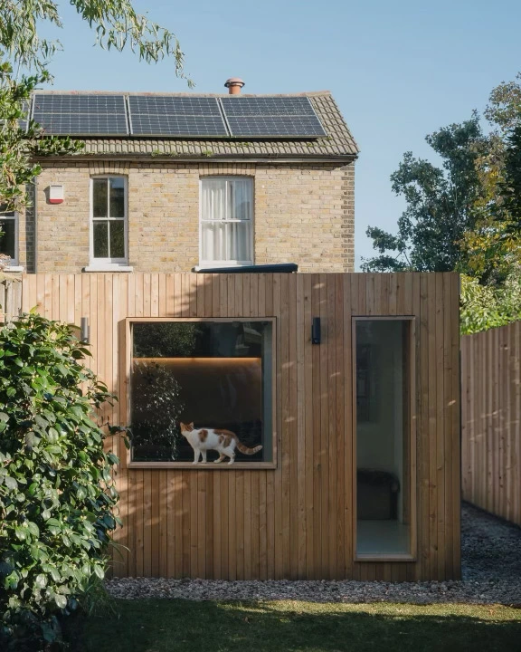 Garden studio daylight larch cladding