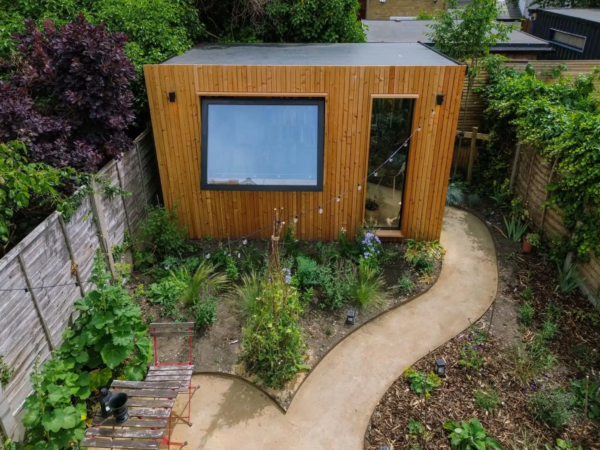 Eden grove exterior with window opener and larch cladding
